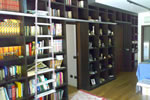 Arredo zona giorno, libreria in rovere